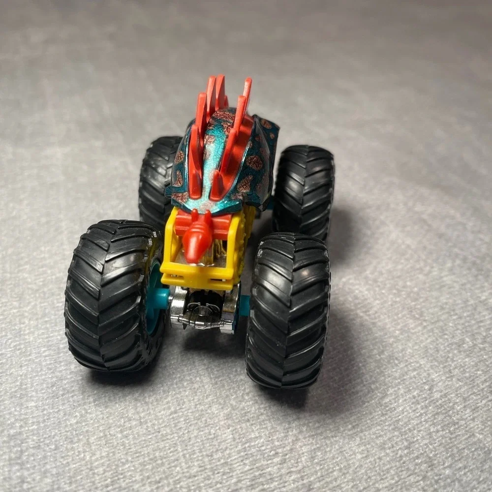 Hot Wheels Monster Truck Dinosaur Styracosaurus Teal Green Red Yellow Toy Kids
